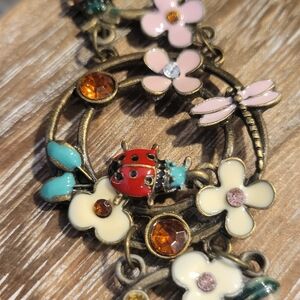 Enamel Floral and Ladybug Charm Bracelet
